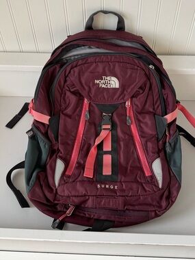 The North Face Burgundy and Pink Surge Backpack